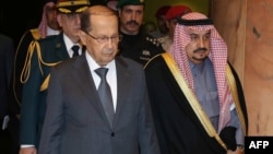 A handout picture released by the Lebanese photo agency Dalati and Nohra shows Riyadh governor Prince Faisal bin Bandar bin Abdulaziz (R) greeting Lebanese President Michel Aoun (L) upon his arrival in Riyadh, Jan. 9, 2017. 
