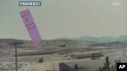 Members of the Muslim Brotherhood and supporters of deposed Egyptian President Mohamed Morsi react at Republican Guard headquarters in Nasr City, in the suburb of Cairo, July 8, 2013.&nbsp;