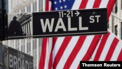 Wall Street vio una mejoría en sus acciones el jueves 14 de mayo tras algunos días a la baja por el temor de los inversores a un estancamiento económico con la pandemia de coronavirus.
