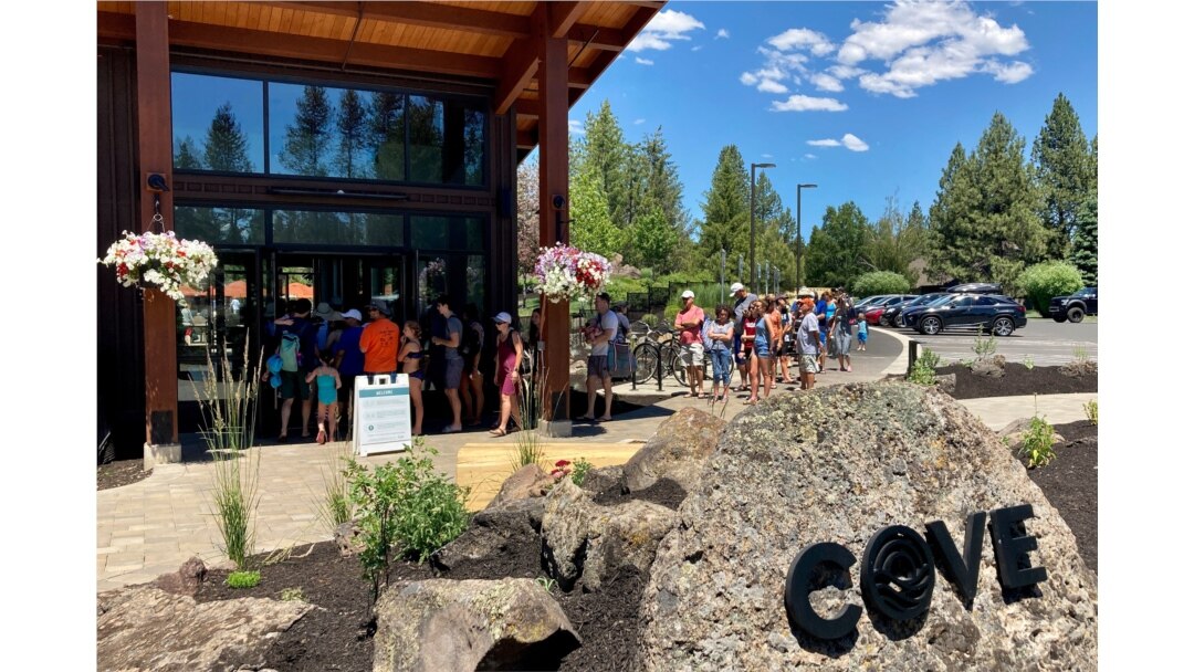 Guests at Sunriver resort near Bend, Oregon line up to get into the pool on June 29, 2021 as temperatures were predicted to hit 106 degrees Fahrenheit.