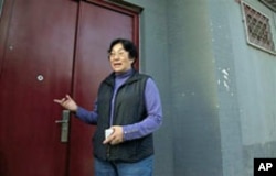 Gao Ge, sister of dissident artist Ai Weiwei, outside the family home in Beijing, China, April 14, 2011