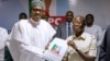 Le président Buhari défend son bilan à quelques mois de la présidentielle nigériane