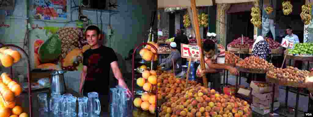 Left: &quot;In his family&#39;s fresh juice shop in Cairo the price of everything is going up, electricity, fruits, sugar and ready-made ice,&quot; explained Magdy, 27. &quot;What we used to sell for 1 Egyptian pound like sugar cane juice now costs us 2 Egyptian pounds. Right: Fruits markets are stagnant due to the rapid rise of prices in Cairo, Egypt.