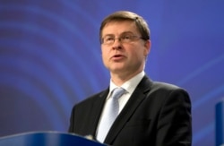 FILE - European Commissioner Valdis Dombrovskis speaks during a media conference at EU headquarters in Brussels, November 21, 2018.