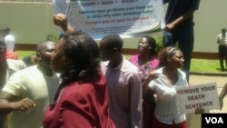 Youths affiliated to the Patriotic Forum for Zimbabwean children of former freedom fighting seen staging a demonstration against targeted sanctions imposed on some Zanu PF officials. (Photo/Irwin Chifera)