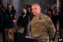 FILE - U.S. Air Force Gen. Glen VanHerck speaks during a news conference on the campus of California State University of Los Angeles in Los Angeles, Feb. 16, 2021.
