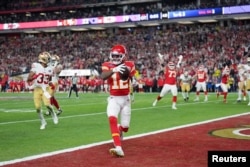 Kansas City Chiefs wide receiver Mecole Hardman Jr. (12) scores a touchdown against the San Francisco 49ers in overtime during Super Bowl LVIII at Allegiant Stadium. (Kirby Lee-USA TODAY Sports)