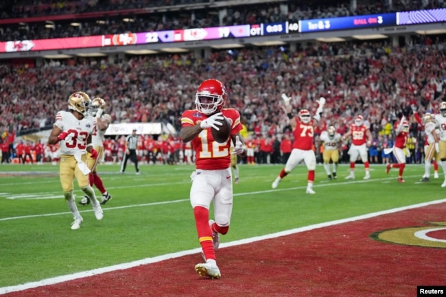 Kansas City Chiefs wide receiver Mecole Hardman Jr. (12) scores a touchdown against the San Francisco 49ers in overtime during Super Bowl LVIII at Allegiant Stadium. (Kirby Lee-USA TODAY Sports)