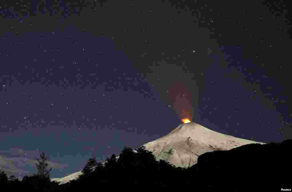 Smoke rises from Villarrica volcano as seen near the town of Pucon in southern Chile.