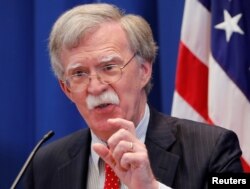 FILE - U.S. National Security Advisor John Bolton speaks during a news conference at the U.S. Mission to the United Nations in Geneva, Switzerland, Aug. 23, 2018.