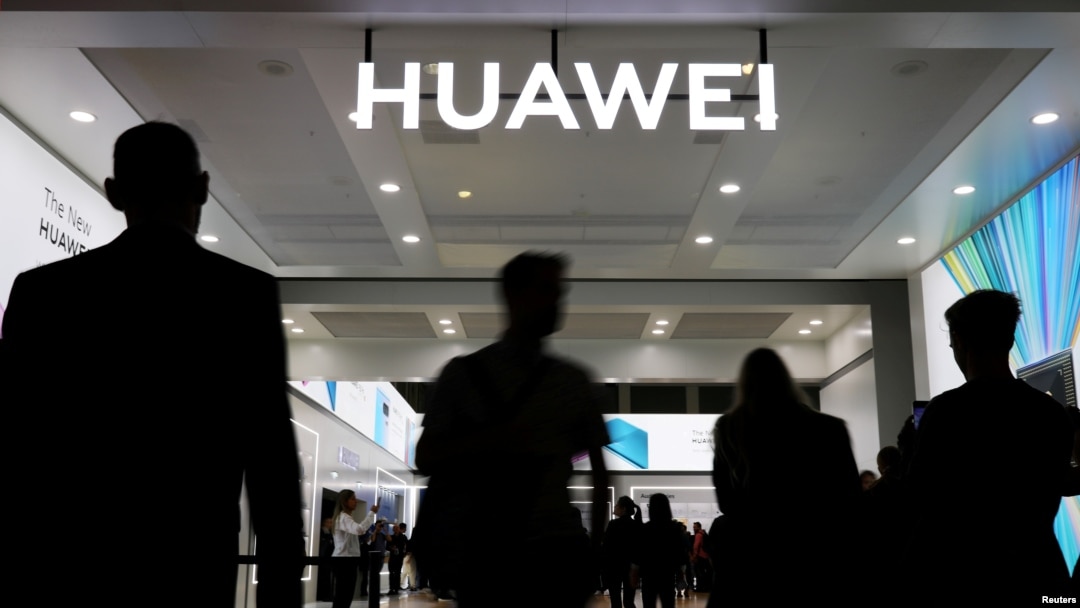 The Huawei logo is pictured at the IFA consumer tech fair in Berlin, Germany, September 6, 2019. REUTERS/Hannibal Hanschke/File Photo