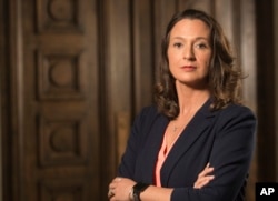 Former Ohio state representative Greta Johnson stands in the Summit County courthouse, May 3, 2019 in Akron, Ohio. Johnson, along with fellow representative Kristin Boggs have sponsored legislation in 2015 and 2017 to address marital rape in Ohio.