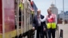 President Joe Biden and Chief Operating Officer of Lobito Atlantic Railway Nicolas Gregoire tour the Lobito Port Terminal in Lobito, Angola, Dec. 4, 2024. 