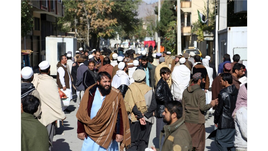 People gather outside of the Pakistan Embassy in Kabul, Afghanistan, Nov. 4, 2019.