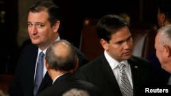 FILE - Republican Senators Ted Cruz and Marco Rubio are seen in the House of Representatives Chamber of the US Capitol after Pope Francis' address Sept. 24, 2015.