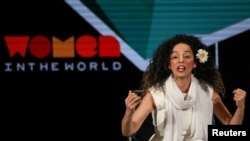 FILE - Masih Alinejad, an Iranian American journalist and women's rights activist, speaks on stage at the Women in the World Summit in New York, April 12, 2019.