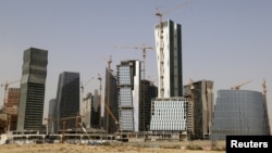 The King Abdullah Financial District, intended as a mini-Dubai, remains a construction site and lacks tenants a year after its scheduled completion just north of Riyadh, Saudi Arabia. 