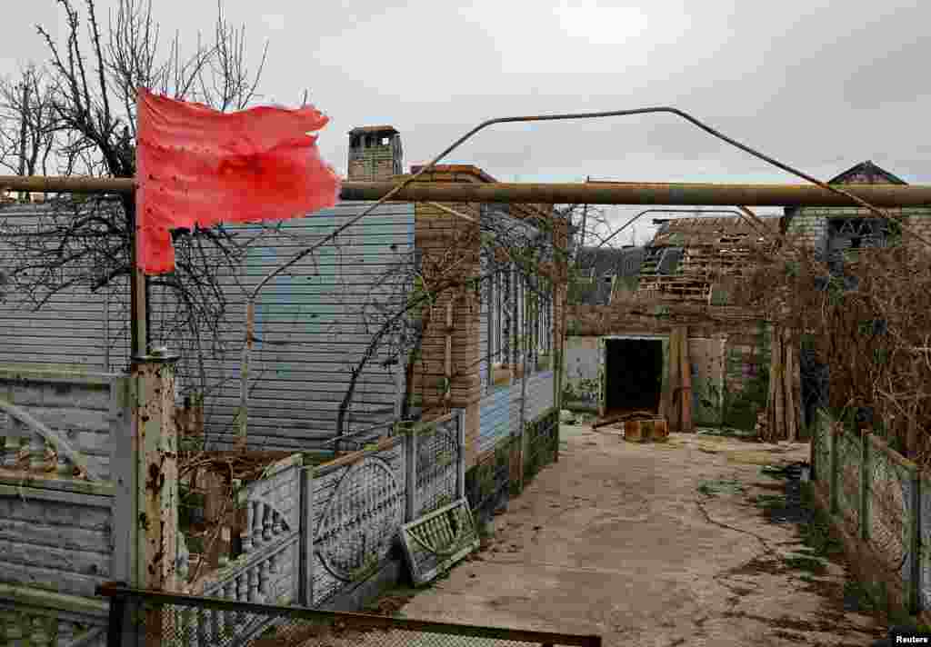 Houses that have been heavily damaged in the course of Russia-Ukraine conflict are seen in the village of Shyrokyne in the Donetsk Region, Russian-controlled Ukraine.