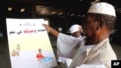 Sudanese election officials check posters to be distributed around Khartoum on March 17, 2010 with the start of the electoral campaign in northern Sudan. The election was also part of the 2005 Comprehensive Peace Agreement that ended over two decades of S