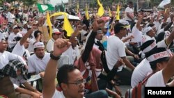 People take part in an Anti-ICERD (International Convention on the Elimination of All Forms of Racial Discrimination) mass rally in Kuala Lumpur, Malaysia, Dec. 8, 2018.