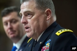 FILE - Army Chief of Staff Gen. Mark Milley testifies on Capitol Hill in Washington before the Senate Armed Services Committee, Feb. 2, 2016.