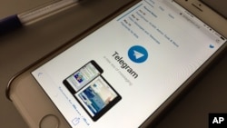 The messaging app Telegram is displayed on a smartphone, July 15, 2017, in Bangkok, Thailand. Indonesia says it’s blocking web versions of the Telegram instant messaging app and will block the app completely if it continues to be a forum for radical propa