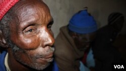 Elderly village residents like Bhasiqhongolo Dodwana are mostly in favor of the community rule designed to prevent alcohol-related violence (D. Taylor /VOA)