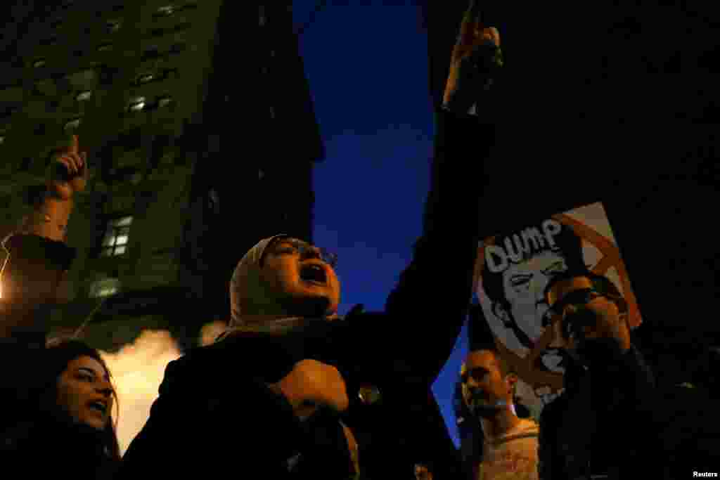 Demonstrators chant slogans during a protest against President-elect Donald Trump in the New York borough of Manhattan, Nov. 12, 2016.