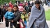 奥地利和德国向成千上万移民开放边界