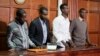 Left to right, Hussein Hassan Mustafah, Adan Dheq, Liban Abdullah Omar, and Mohamed Ahmed Abdi, who are charged with aiding the gunmen involved in the Westgate Mall attack in Sept. 2013, appear during their ongoing trial at Milimani court in Nairobi, Kenya, Dec. 20, 2018.