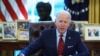 Le président américain Joe Biden dans le Bureau ovale de la Maison Blanche à Washington, DC, le 28 janvier 2021.