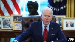 Le président américain Joe Biden dans le Bureau ovale de la Maison Blanche à Washington, DC, le 28 janvier 2021.