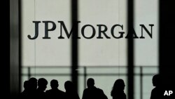 The JPMorgan Chase & Co. logo is displayed at their headquarters in New York, Oct. 21, 2013. 