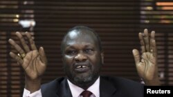 Kiongozi wa waasi Riek Machar akihutubia kikao mjini Kampala,Uganda, Januari mwaka huu. 