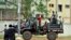 FILE - A truck with former Seleka coalition rebels drives through Bangui, Central African Republic, Oct. 7, 2013.