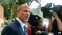 FILE - Michael Avenatti talks to reporters outside Los Angeles County Superior Court, July 10, 2018.