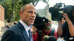 Adult actress Stormy Daniels' lawyer Michael Avenatti talks to the media outside of Los Angeles County Superior Court after a hearing in Los Angeles, July 10, 2018. 