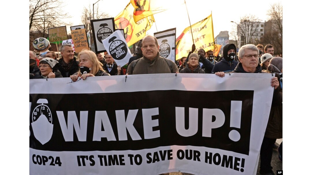 Climate activists attend the March for Climate in a protest against global warming in Katowice, Poland, Dec. 8, 2018, as the COP24 UN Climate Change Conference takes place in the city.
