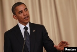 US President Barack Obama speaks during a joint media conference with Thai Prime Minister Yingluck Shinawatra at Government House in Bangkok, November 18, 2012.