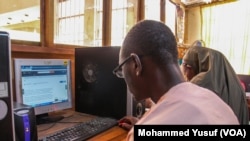 A university student uses offline digital library to read and download educational material at Ahmadu Bello University computer library.