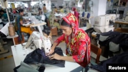 FILE - A worker is seen in a garment factory in Savar, Bangladesh.