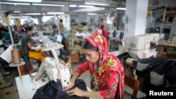 FILE - A worker is seen in a garment factory in Savar, Bangladesh.