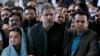 Shahid Khaqan Abbasi, center, speaks to reporters following a supreme court decision in Islamabad, Pakistan, March 26, 2019.