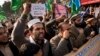 Supporters of Pakistani religious party Jamaat-i-Islami rally to protest against French satirical magazine Charlie Hebdo in Islamabad, Pakistan, Jan. 16, 2015. 