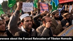 Supporters of Pakistani religious party Jamaat-i-Islami rally to protest against French satirical magazine Charlie Hebdo in Islamabad, Pakistan, Jan. 16, 2015. 