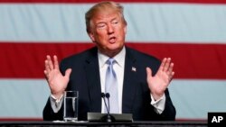 President Donald Trump speaks during a roundtable discussion on tax policy at the Boeing Company, March 14, 2018, during a visit to in St. Louis, Missouri. 