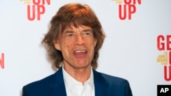 FILE - Mick Jagger attends the world premiere of "Get On Up" at the Ham Yard Hotel in central London, Sept. 14, 2014. 