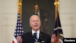 President Joe Biden speaks about the administration's response to the coronavirus (COVID-19) pandemic at the White House in Washington, U.S., March 2, 2021. Overall, 70% of Americans back his handling of the virus response, including 44% of Republicans.