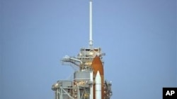 This photo provided by NASA shows the space shuttle Discovery on launch pad 39a at the NASA Kennedy Space Center in Cape Canaveral, Florida, 31 Oct 2010