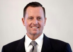 FILE - U.S. ambassador to Germany, Richard Grenell, poses for the media prior to his accreditation at the Bellevue Palace in Berlin, Germany, May 8, 2018.